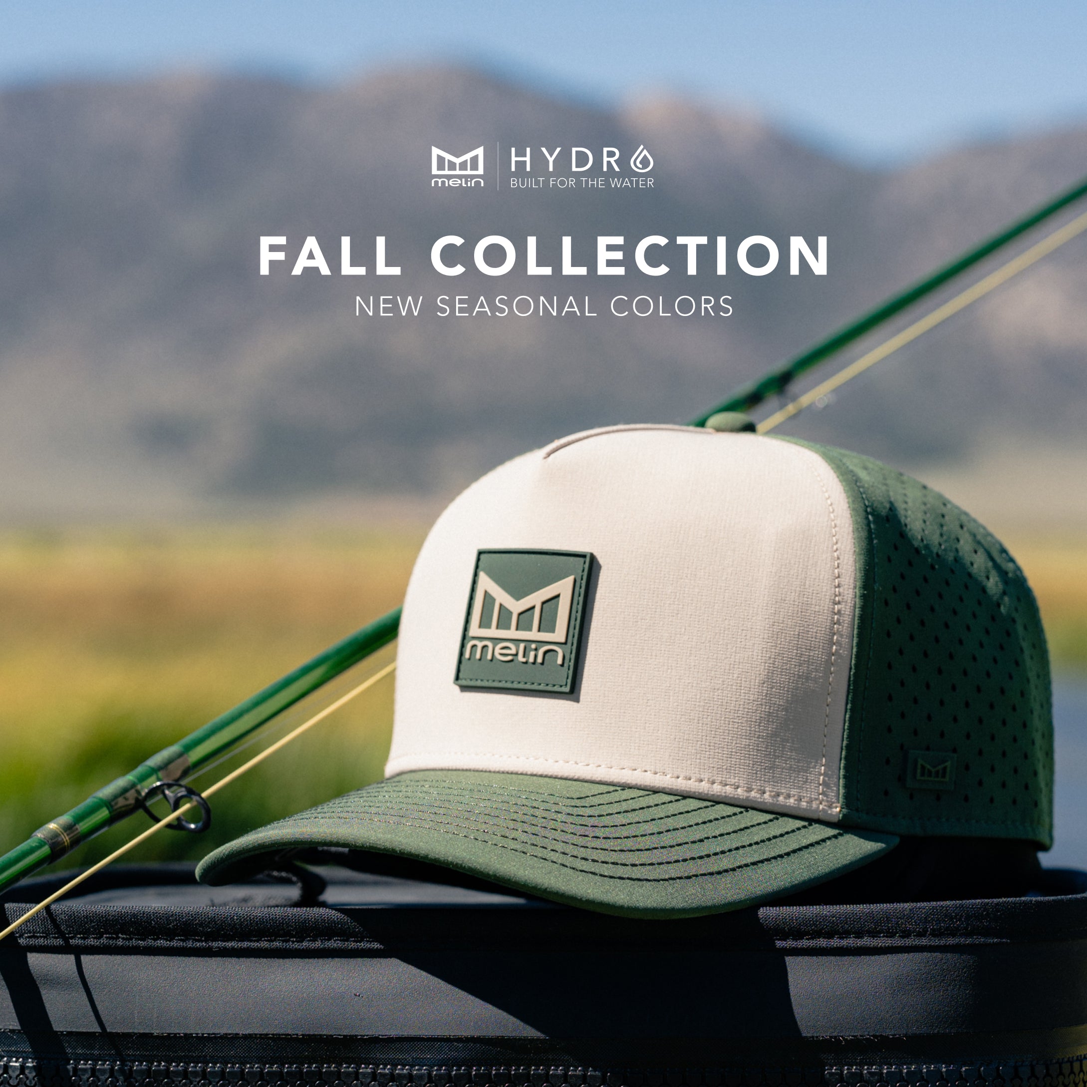 Green and beige cap with Melin logo on a fishing rod against a mountainous background, featuring Hydro brand.